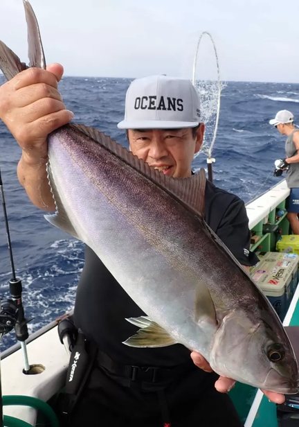 Fisherman holding his catch